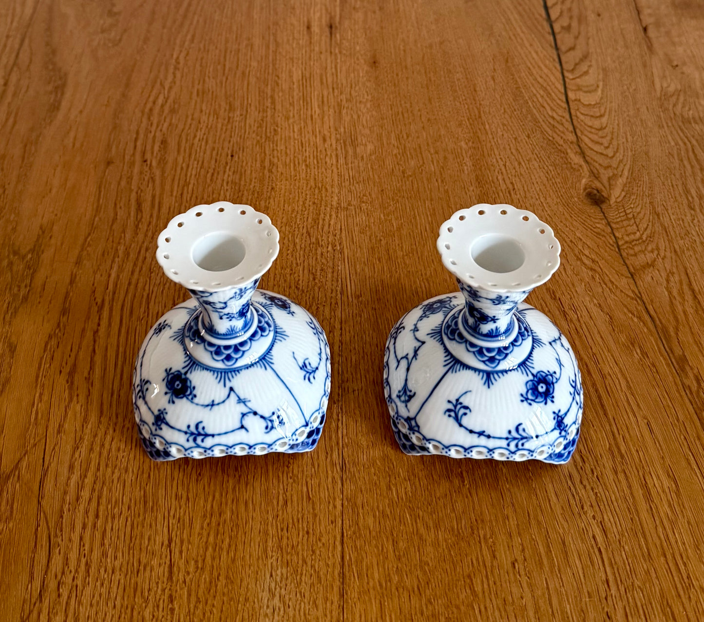 A set of two Royal Copenhagen Blue Fluted Full Lace candle sticks (#1038)