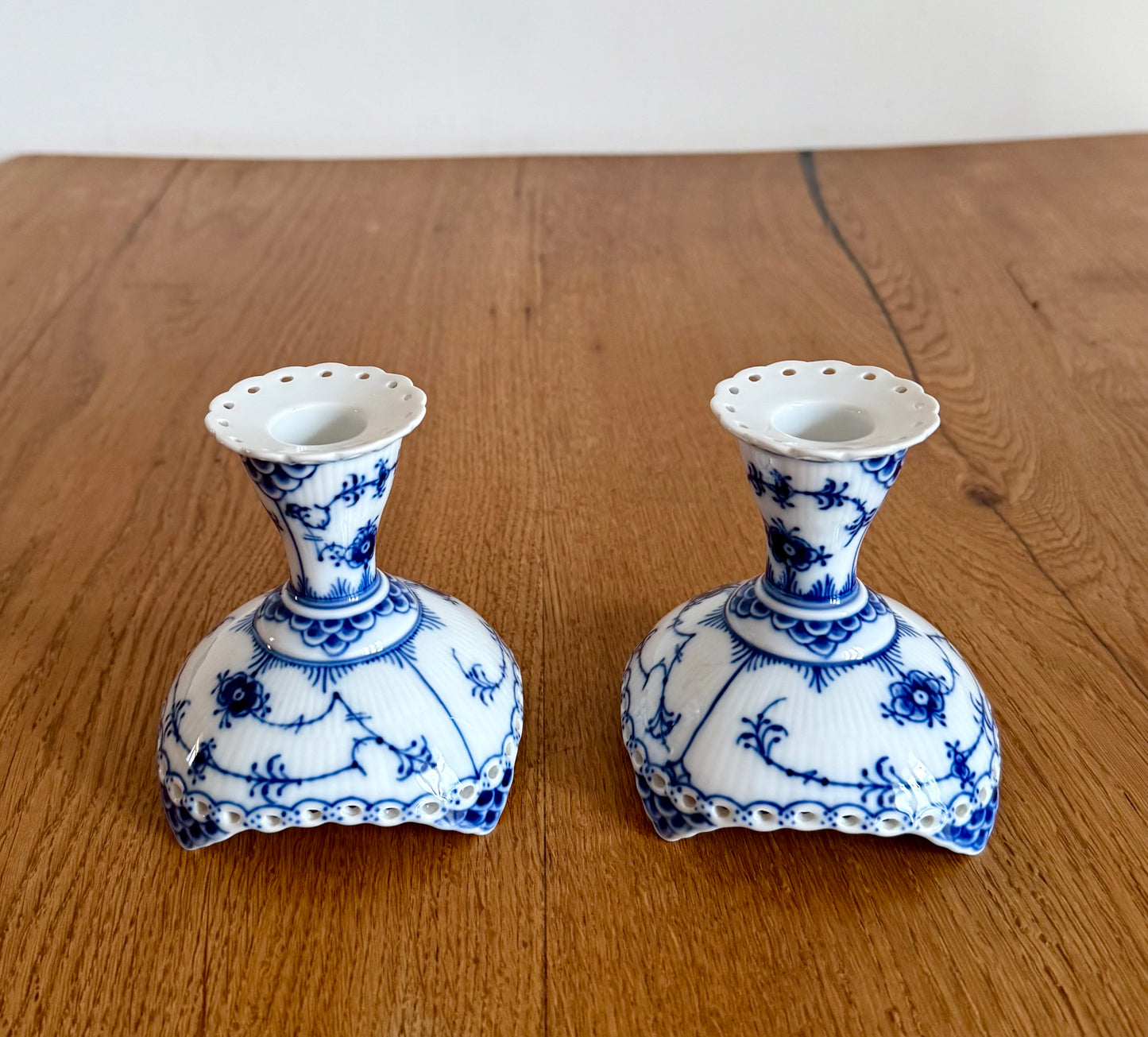 A set of two Royal Copenhagen Blue Fluted Full Lace candle sticks (#1038)