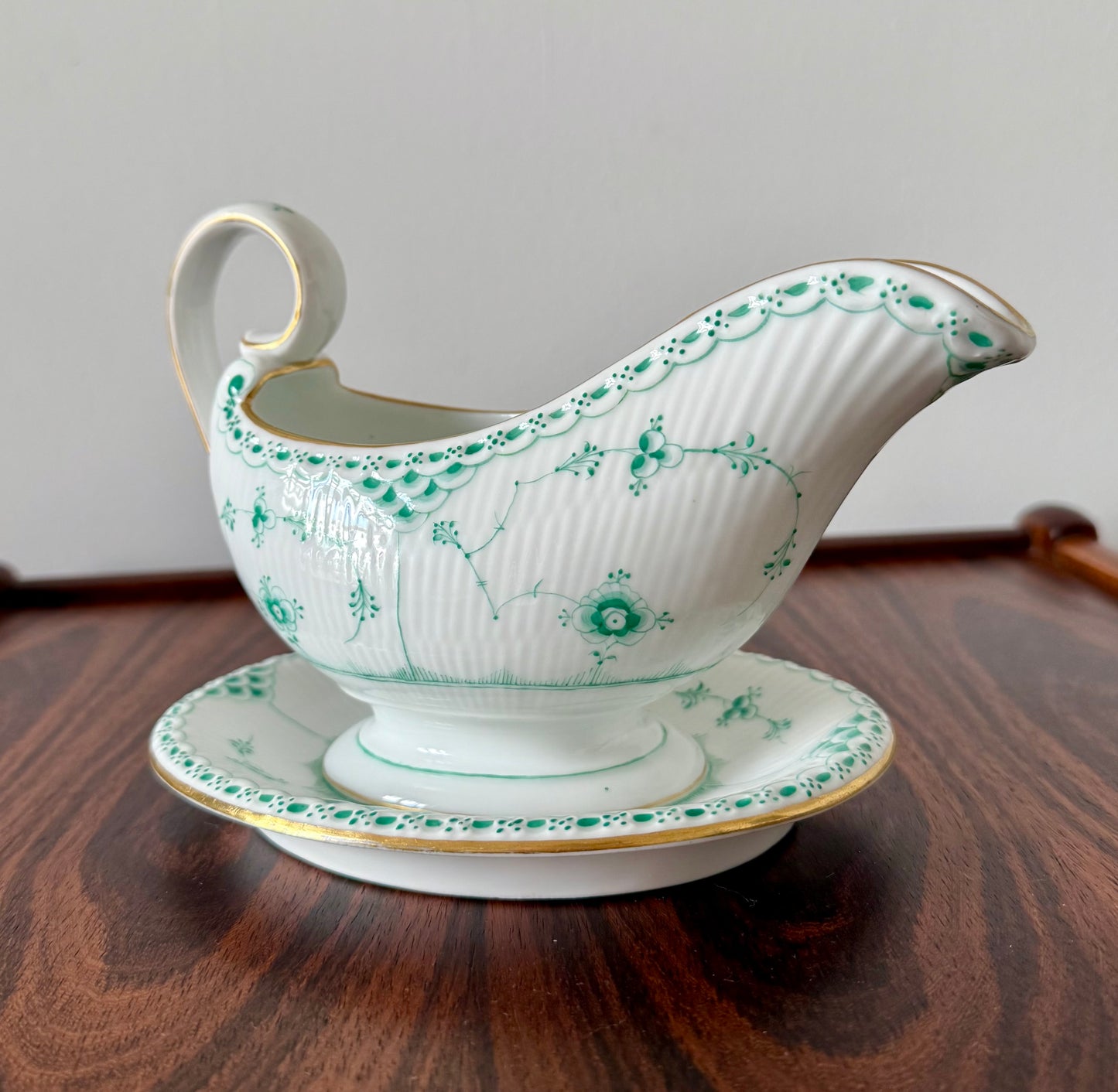 Royal Copenhagen sauce jug in Green Fluted Half Lace with gold.