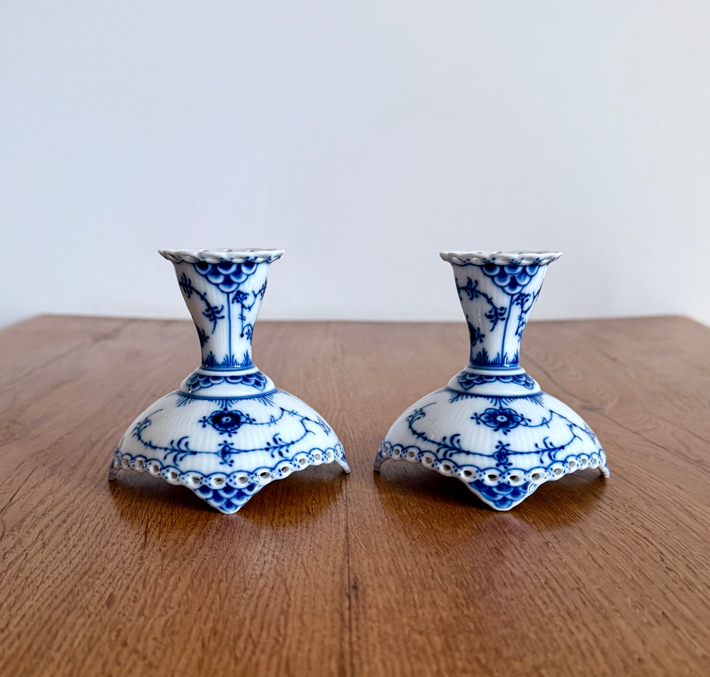A set of two Royal Copenhagen Blue Fluted Full Lace candle sticks (#1038)