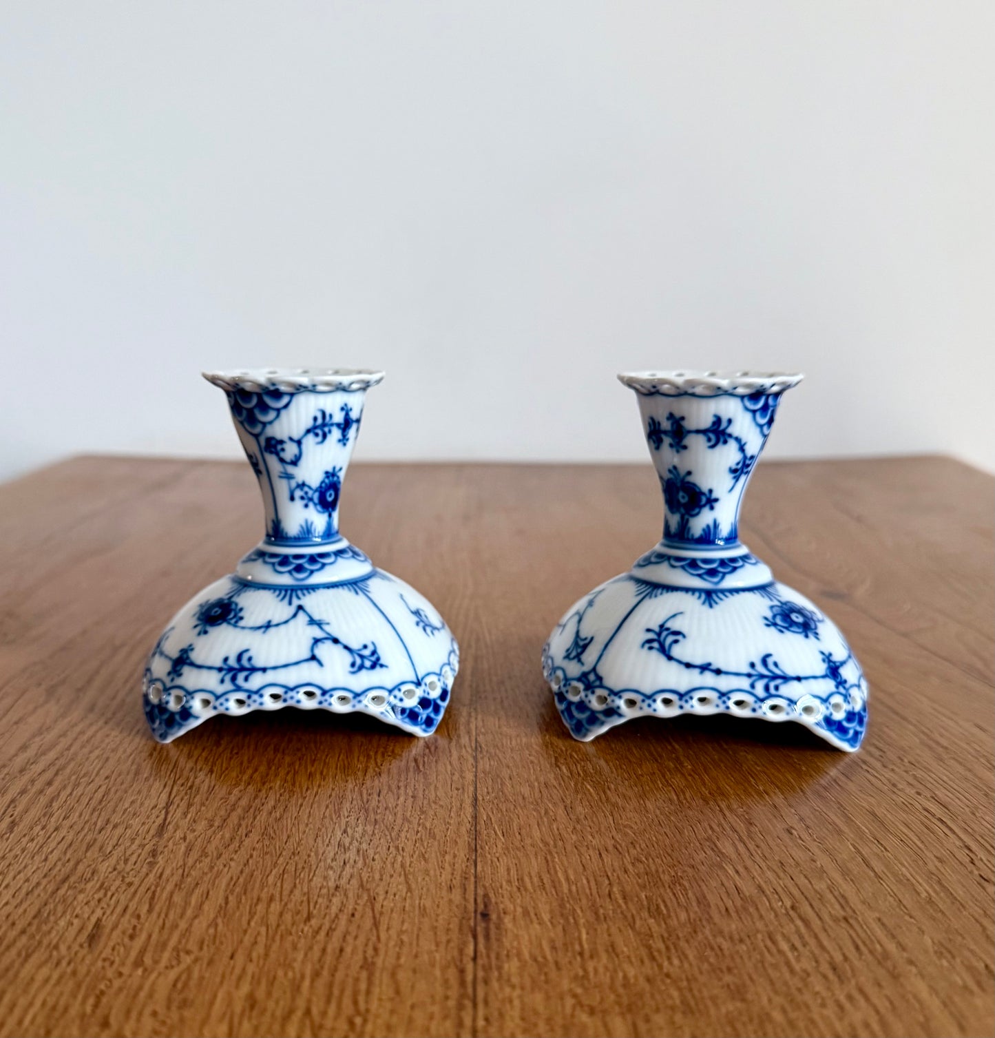A set of two Royal Copenhagen Blue Fluted Full Lace candle sticks (#1038)